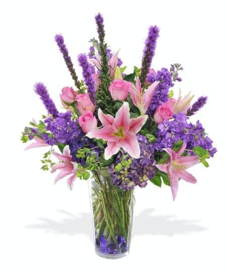 A beautiful arrangement filled with liatris, roses, oriental lilies, hydrangea,