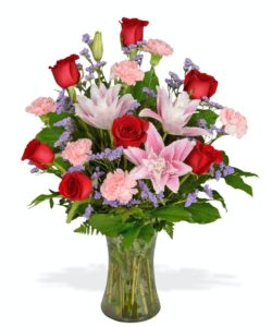 Romantic roses pink lilies and greenery