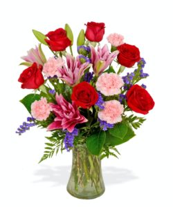 Colorful flowers in a vase. Hues of pink, purple and red are sure to brighten anyone's day.